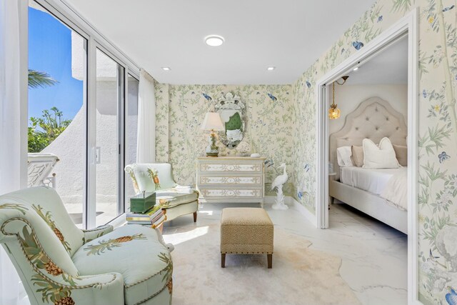 bedroom featuring baseboards, marble finish floor, and wallpapered walls