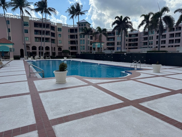 community pool with a patio