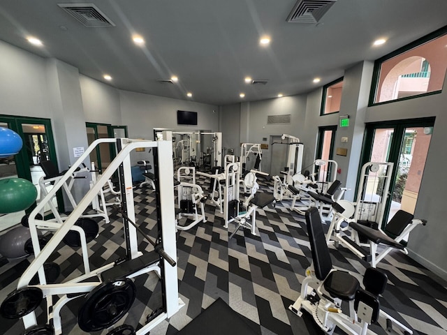 workout area featuring recessed lighting, visible vents, and carpet flooring