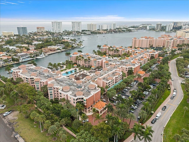 bird's eye view featuring a view of city and a water view