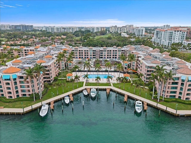 aerial view featuring a city view and a water view