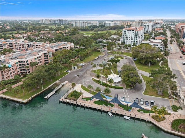 aerial view with a city view and a water view