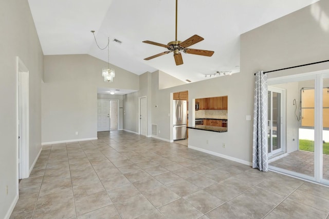 unfurnished living room featuring visible vents, baseboards, ceiling fan, light tile patterned flooring, and high vaulted ceiling