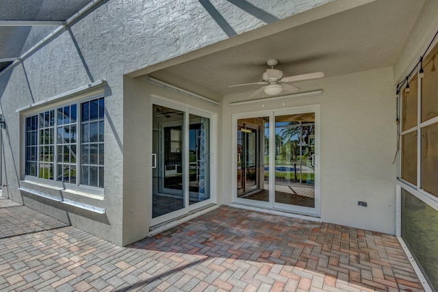 view of patio featuring a ceiling fan