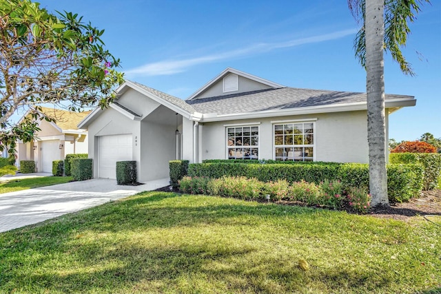 single story home featuring stucco siding, a front lawn, concrete driveway, and a garage