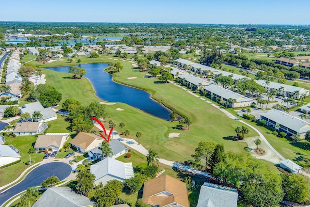 bird's eye view featuring a residential view, a water view, and view of golf course