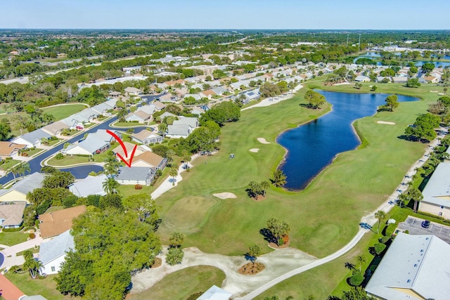 birds eye view of property featuring a residential view, a water view, and golf course view