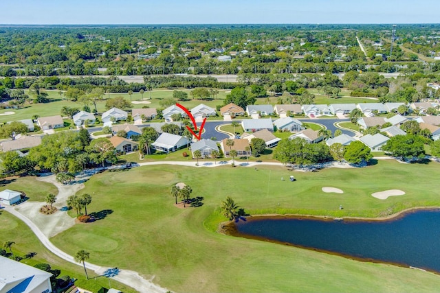 bird's eye view with a residential view, a water view, and view of golf course