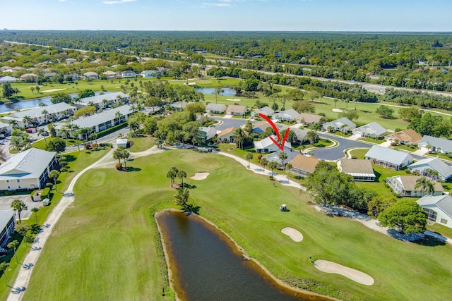 bird's eye view with a residential view, golf course view, and a water view