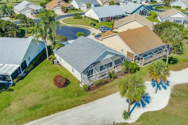 birds eye view of property with a residential view