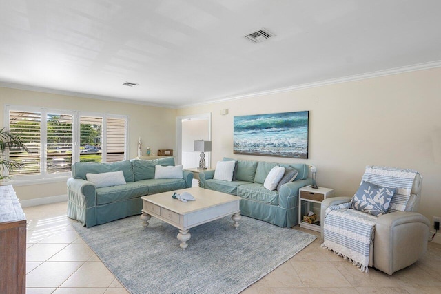 living area with light tile patterned floors, visible vents, baseboards, and ornamental molding