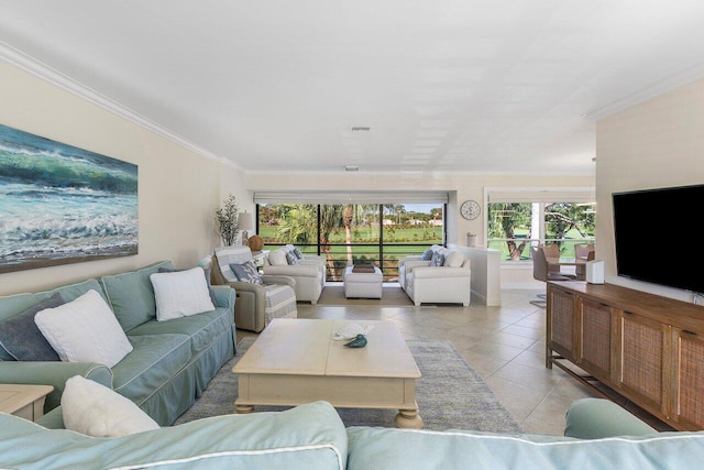 tiled living area featuring visible vents and crown molding