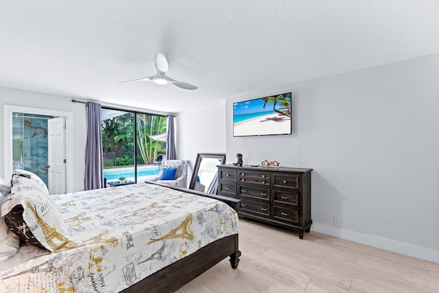 bedroom with light wood-type flooring, a ceiling fan, access to outside, a textured ceiling, and baseboards