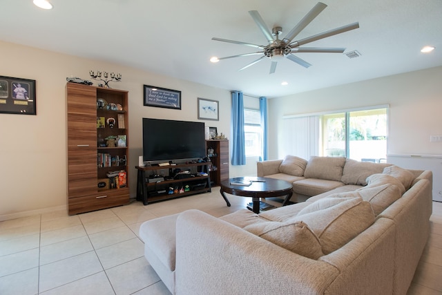 living area featuring light tile patterned floors, ceiling fan, visible vents, and recessed lighting