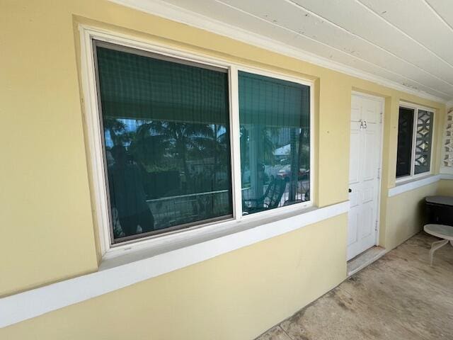 view of side of property with stucco siding