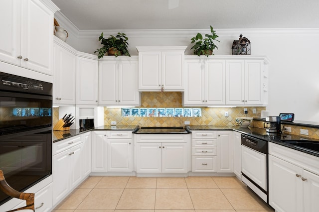 kitchen featuring black appliances, ornamental molding, tasteful backsplash, white cabinetry, and light tile patterned flooring