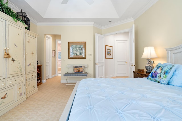 bedroom featuring a ceiling fan, baseboards, ornamental molding, light carpet, and a raised ceiling