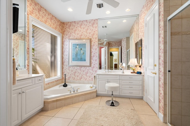 bathroom featuring tile patterned flooring, visible vents, wallpapered walls, a garden tub, and vanity