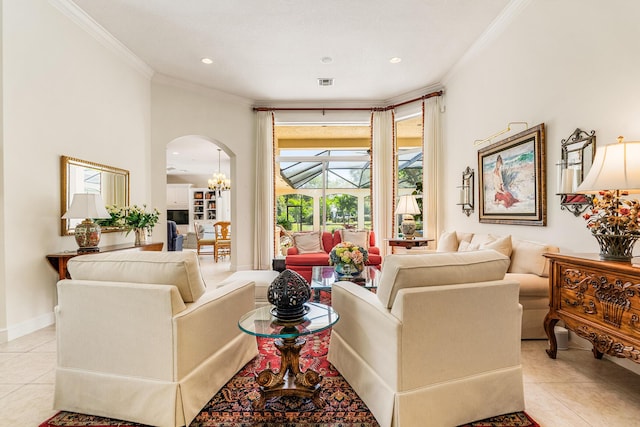 living area featuring crown molding, light tile patterned floors, visible vents, and arched walkways