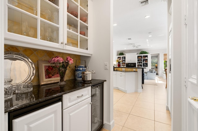 bar featuring visible vents, recessed lighting, wine cooler, light tile patterned flooring, and decorative backsplash