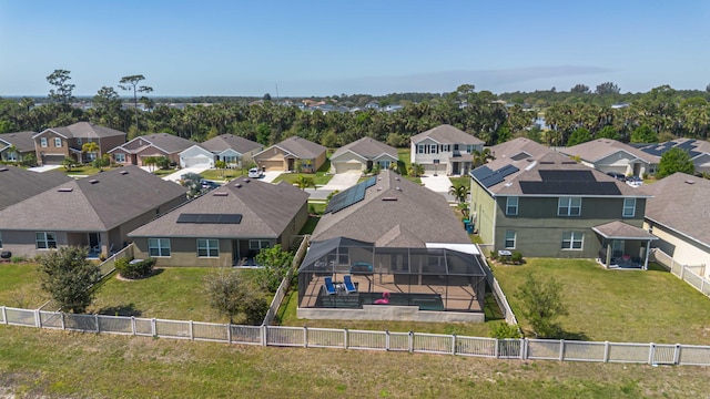 birds eye view of property with a residential view