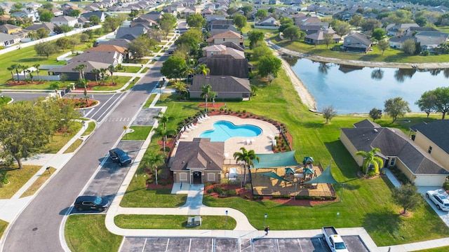 aerial view featuring a residential view and a water view