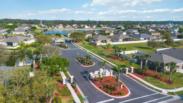 aerial view featuring a residential view and a water view