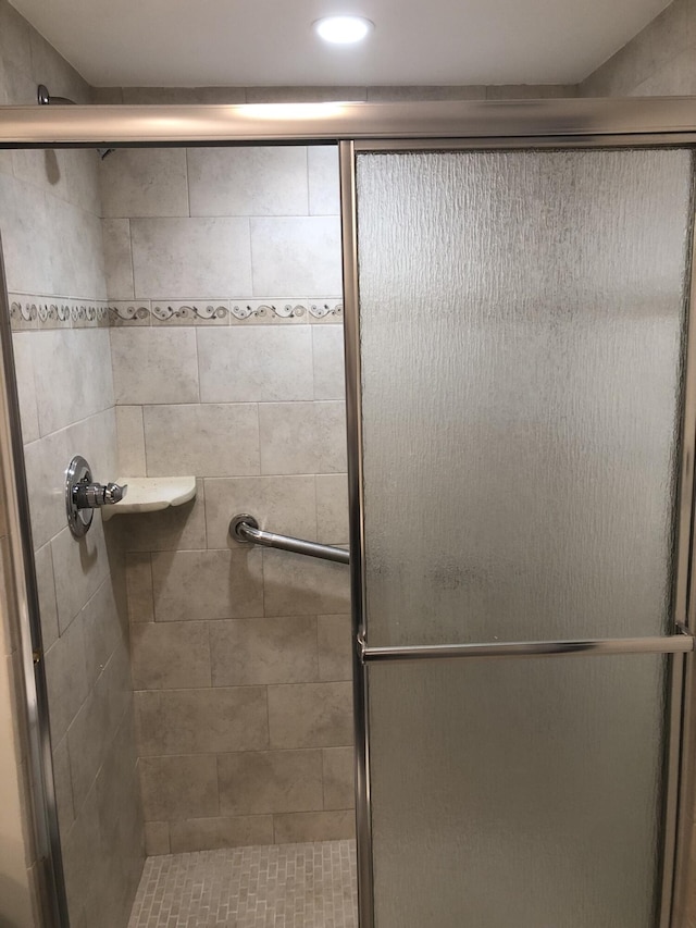 bathroom with a stall shower