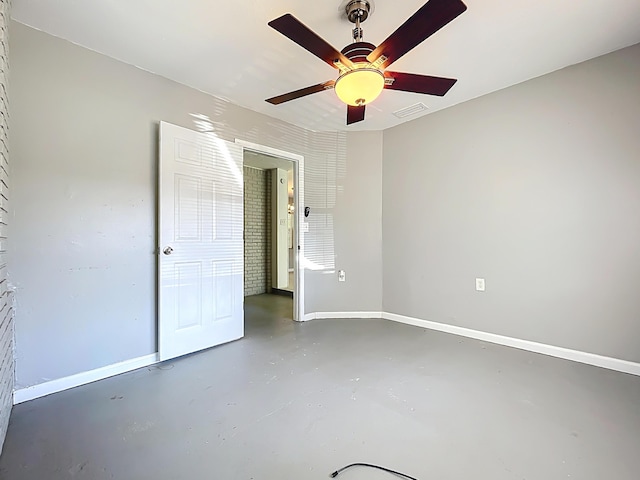 1201 Susan St, Leesburg, FL 34748 - unfurnished bedroom with visible vents, baseboards, ceiling fan, and finished concrete flooring