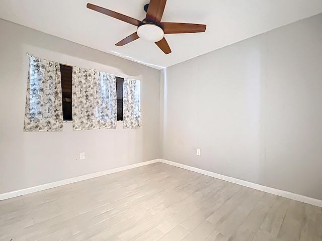 1201 Susan St, Leesburg, FL 34748 - spare room featuring ceiling fan, wood finished floors, and baseboards