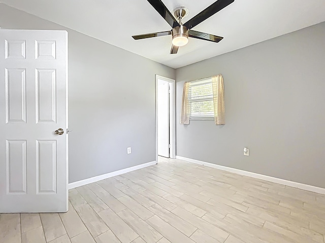 1201 Susan St, Leesburg, FL 34748 - empty room featuring ceiling fan, light wood finished floors, and baseboards
