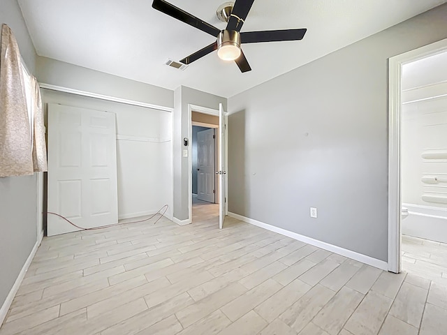 1201 Susan St, Leesburg, FL 34748 - unfurnished bedroom with light wood-type flooring, a closet, a ceiling fan, visible vents, and baseboards
