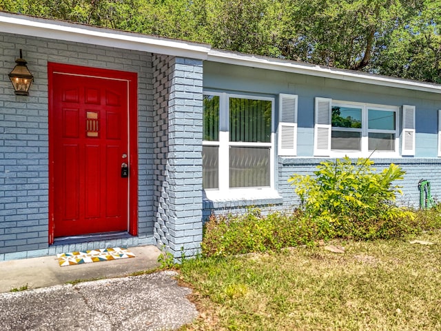 1201 Susan St, Leesburg, FL 34748 - view of exterior entry with brick siding
