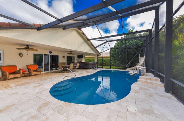 outdoor pool with a water slide, ceiling fan, a patio area, an outdoor living space, and a lanai