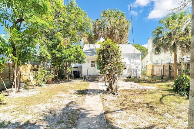 view of yard with a fenced backyard