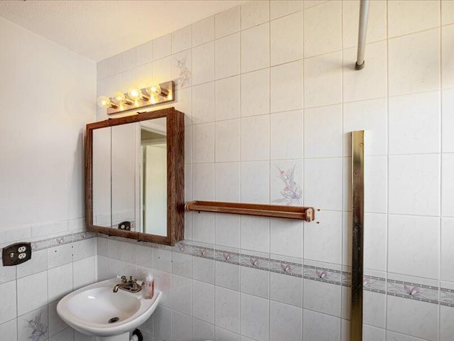 1821 SE Hanby Ave, Port Saint Lucie, FL 34952 - bathroom with a sink and tile walls