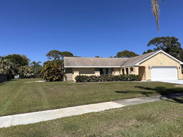 ranch-style house featuring an attached garage, stucco siding, concrete driveway, and a front yard