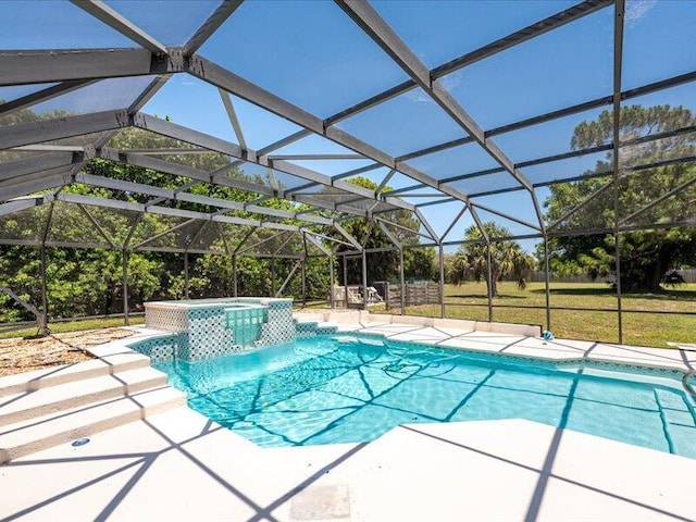 1821 SE Hanby Ave, Port Saint Lucie, FL 34952 - view of pool with a patio area, a pool with connected hot tub, and a lanai