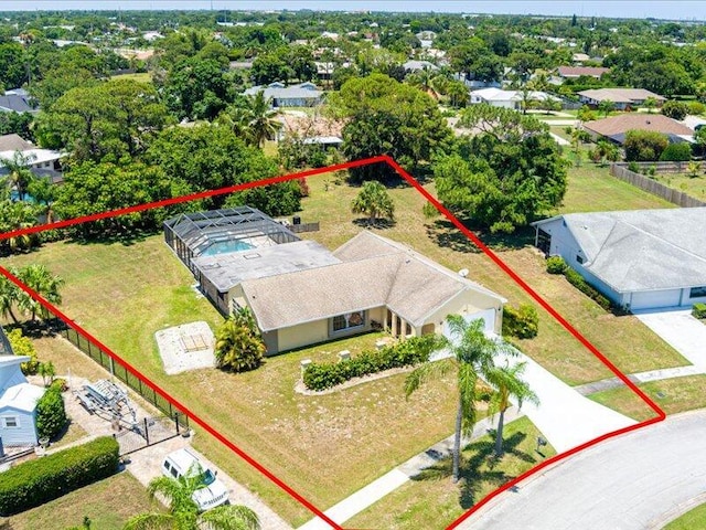 1821 SE Hanby Ave, Port Saint Lucie, FL 34952 - aerial view of property and surrounding area with property parcel outlined