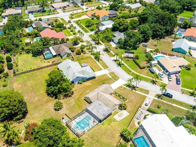1821 SE Hanby Ave, Port Saint Lucie, FL 34952 - aerial view of residential area featuring a pool area