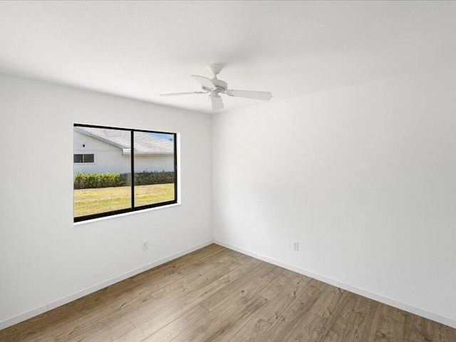 1821 SE Hanby Ave, Port Saint Lucie, FL 34952 - spare room with wood finished floors and baseboards
