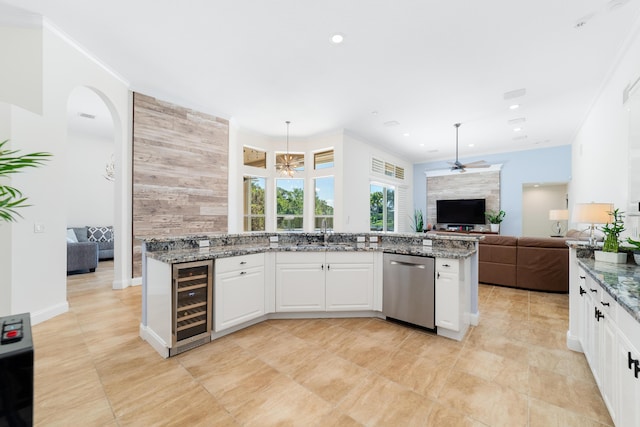 15730 Cedar Grove Ln, Wellington, FL 33414 - kitchen with dishwasher, ceiling fan, wine cooler, a sink, and open floor plan