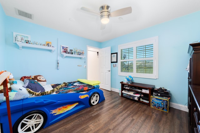 15730 Cedar Grove Ln, Wellington, FL 33414 - bedroom featuring dark wood-type flooring, baseboards, ceiling fan, and visible vents