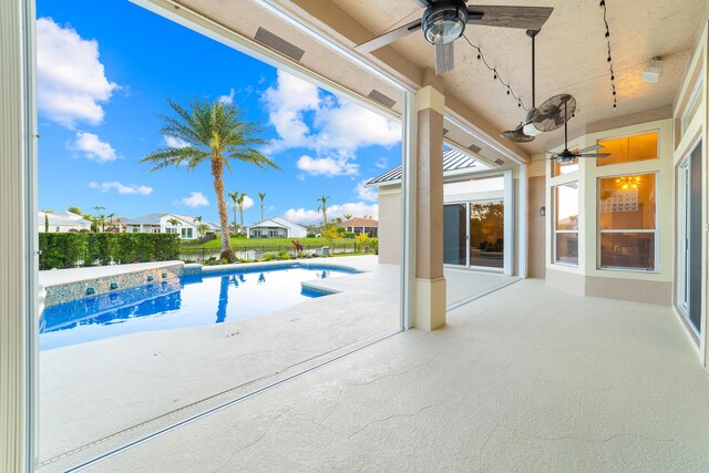 15730 Cedar Grove Ln, Wellington, FL 33414 - view of swimming pool featuring a patio, a fenced in pool, a ceiling fan, and a residential view