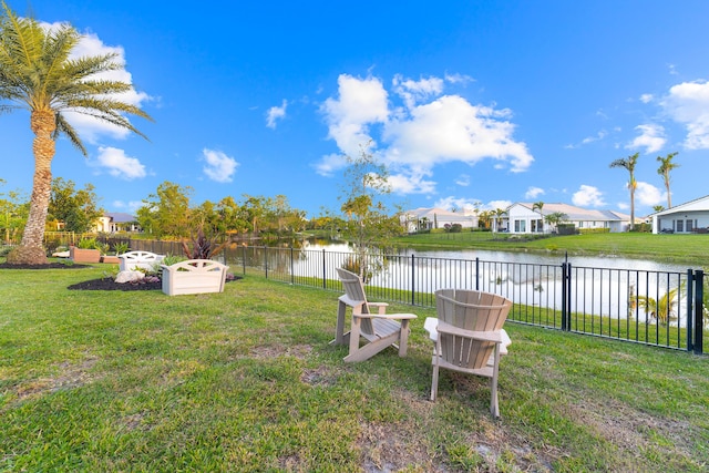 15730 Cedar Grove Ln, Wellington, FL 33414 - view of yard featuring a water view, fence, and a residential view