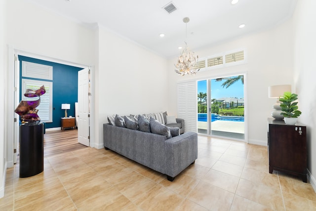 15730 Cedar Grove Ln, Wellington, FL 33414 - living room with visible vents, baseboards, ornamental molding, an inviting chandelier, and light tile patterned floors