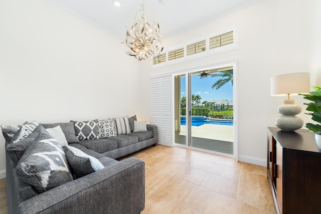 15730 Cedar Grove Ln, Wellington, FL 33414 - living room featuring light tile patterned floors, ornamental molding, baseboards, and a chandelier
