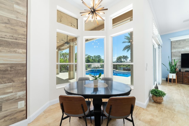 15730 Cedar Grove Ln, Wellington, FL 33414 - dining room featuring light tile patterned flooring, baseboards, and ornamental molding