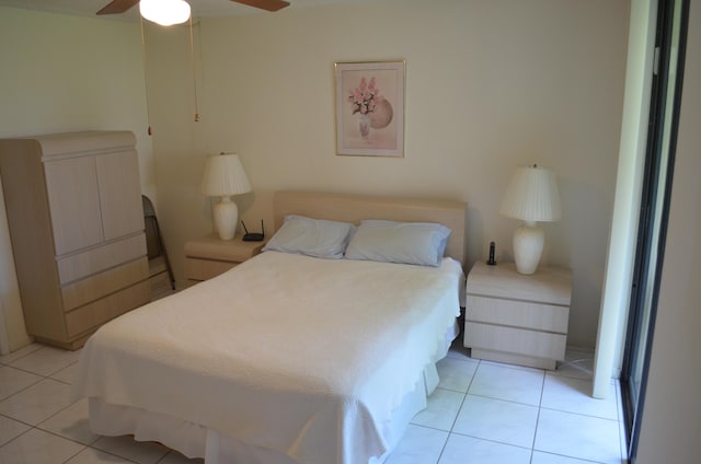 bedroom featuring light tile patterned floors and a ceiling fan