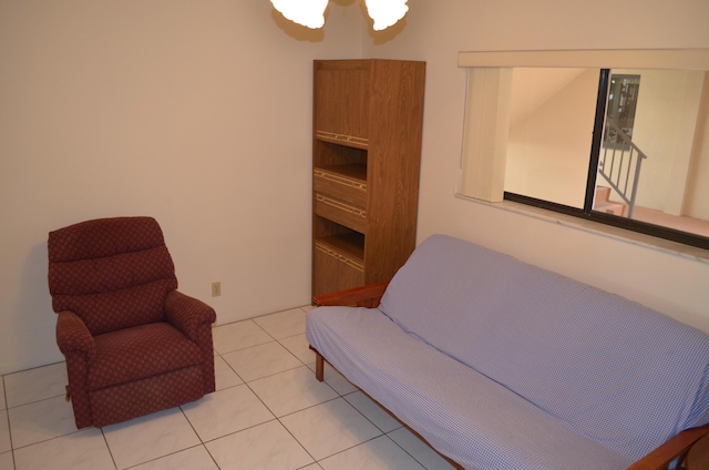 sitting room with light tile patterned floors